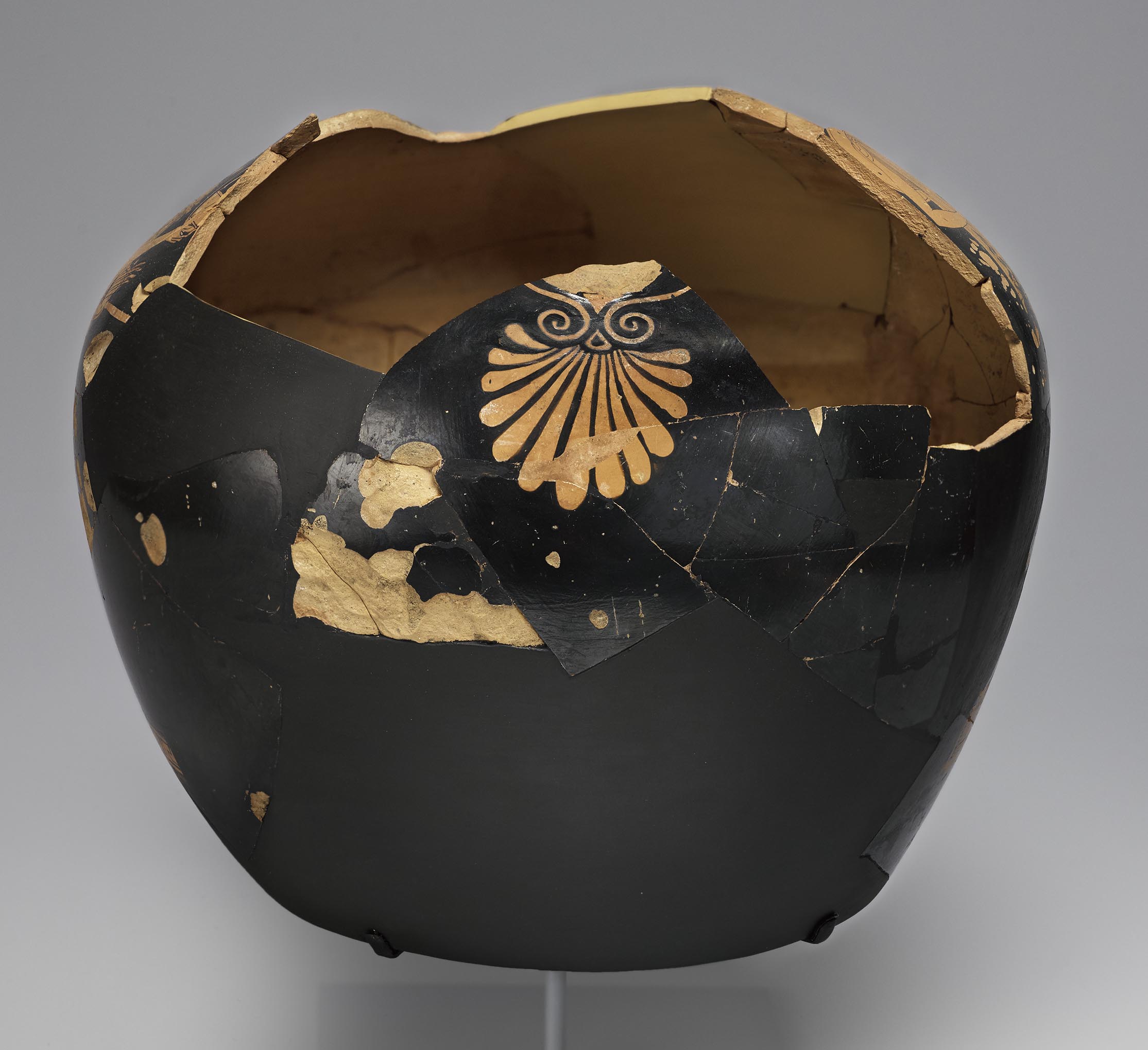 Side view of the vase, showing some decoration on the right side but not showing the figures