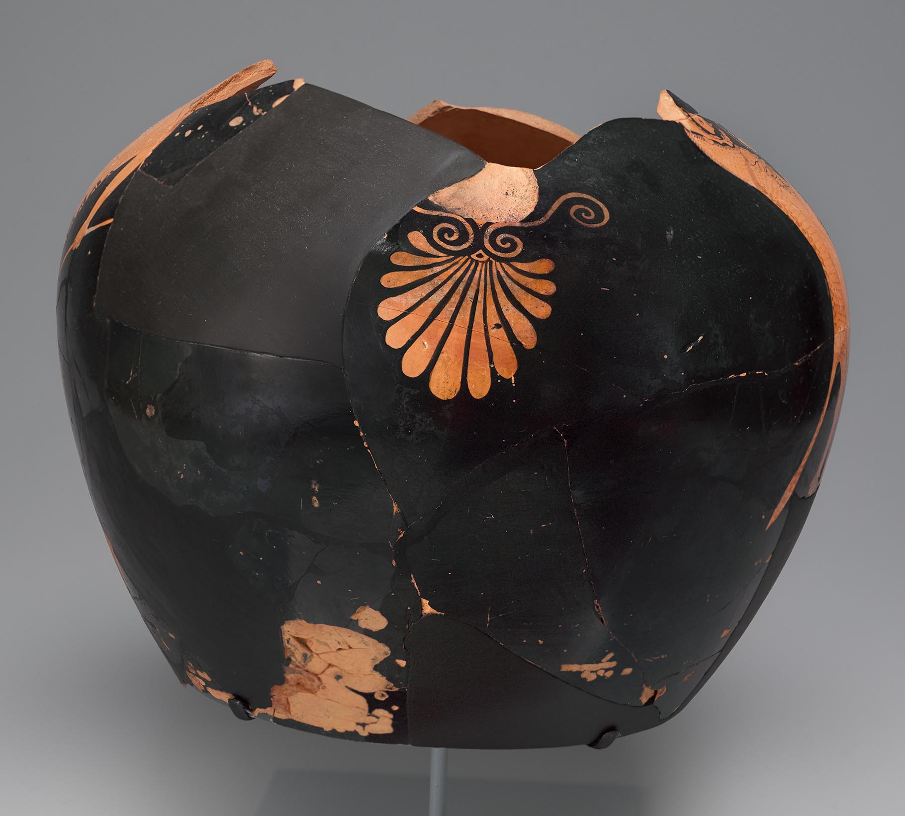 The other side of the vase, showing some decoration on the left side but not showing the figures