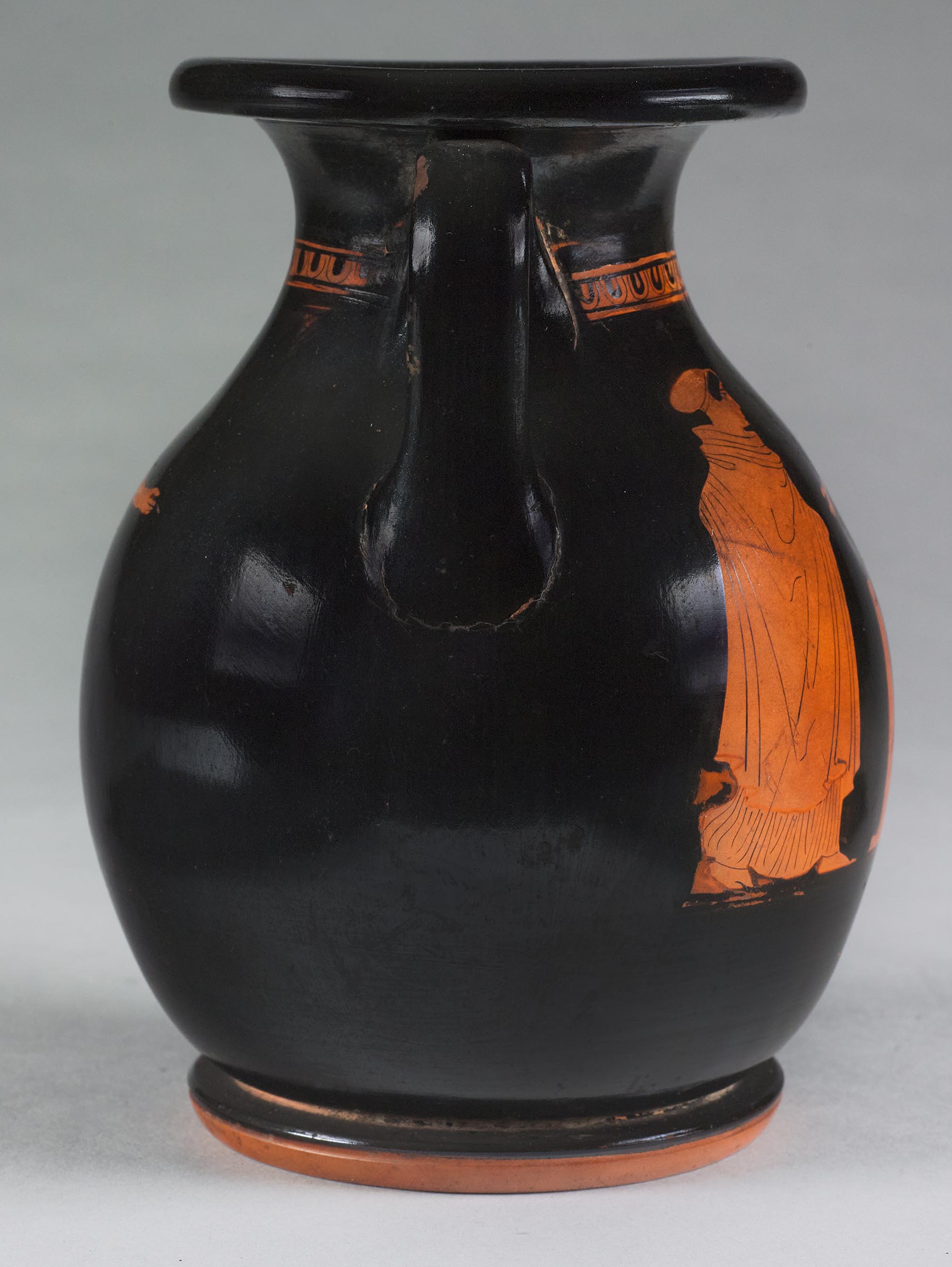 The other side of the vase, showing some decoration on the left side but not showing the figures