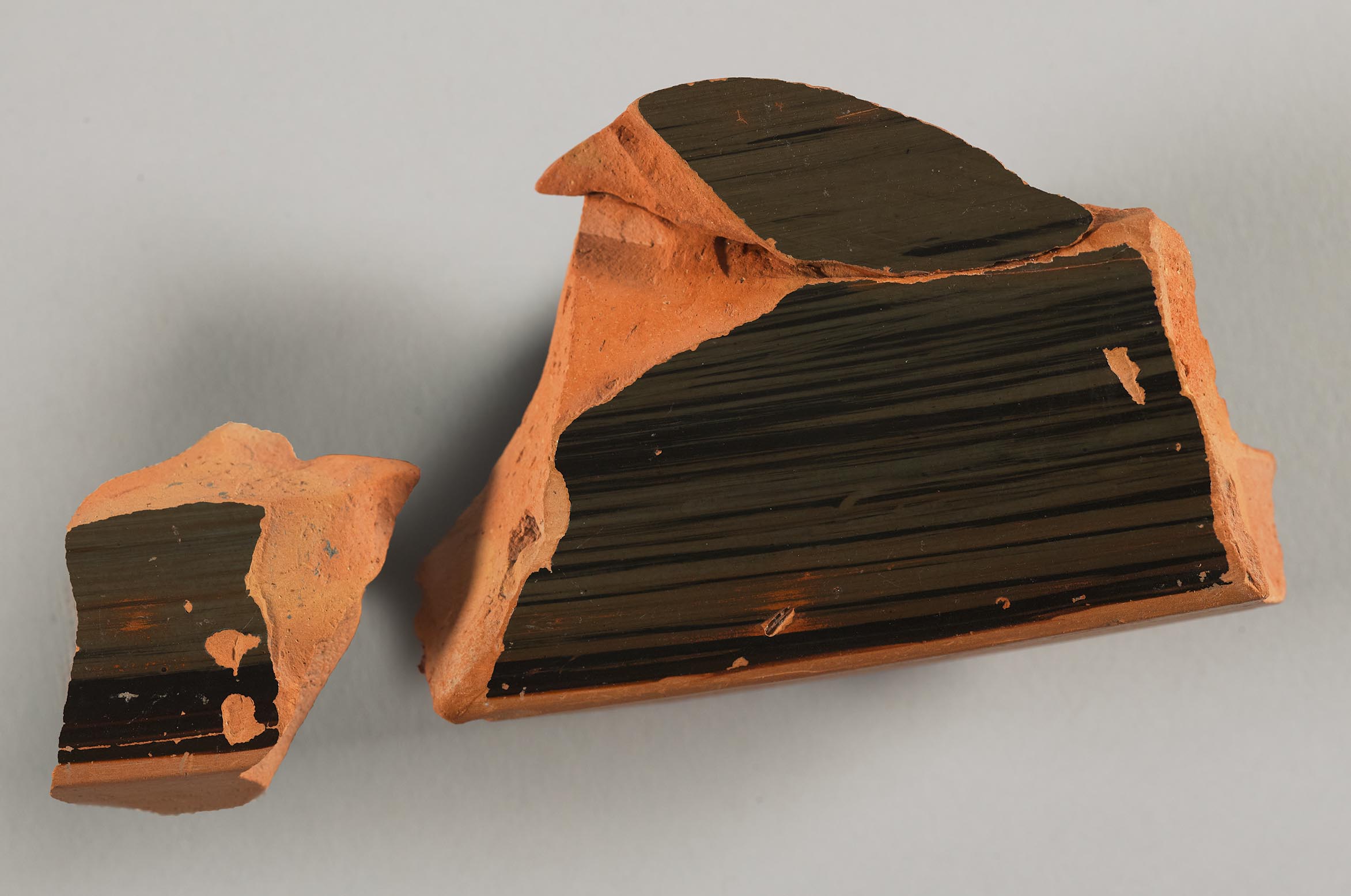 Another view of a fragment from a vase, fired black