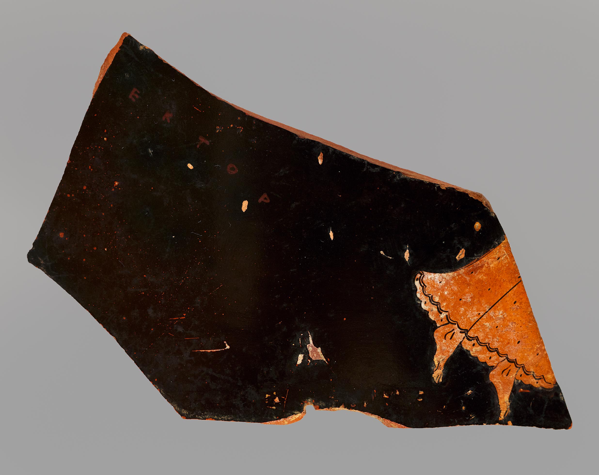 One fragment from a krater, depicting the feet of a flying Nike