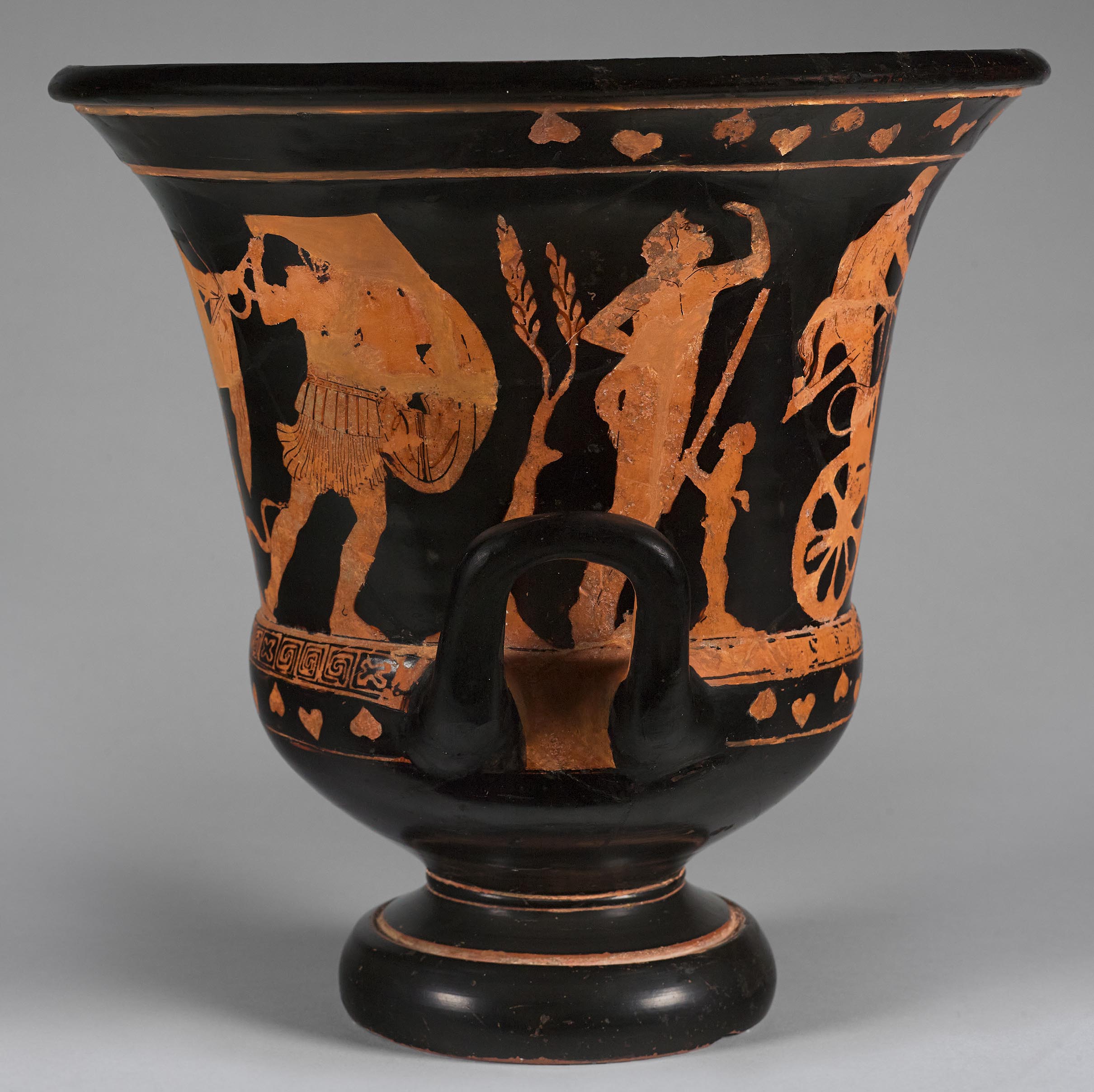Side view of the vase, showing the figures on the right side