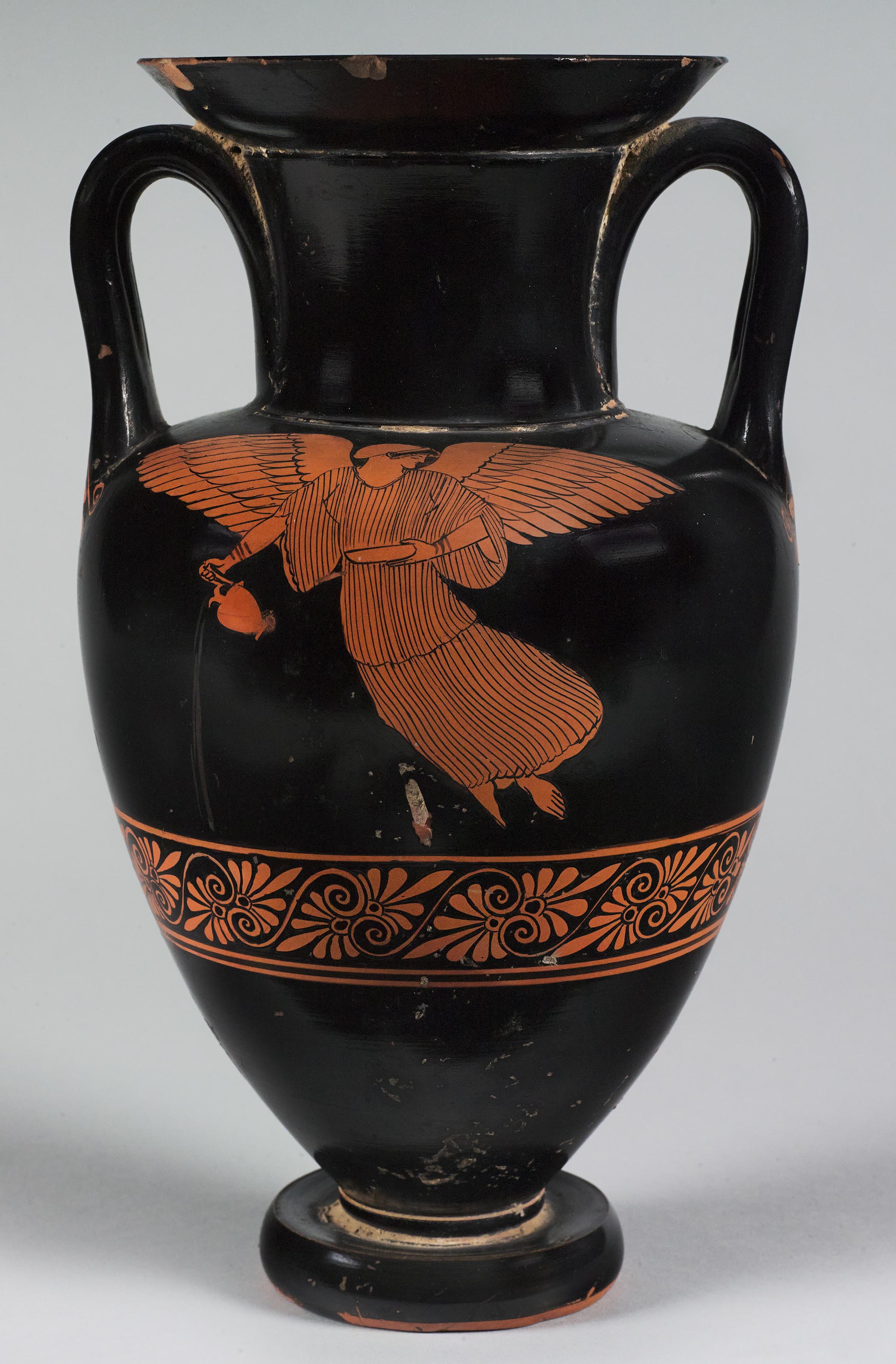 One view of a vase, the body depicting Nike