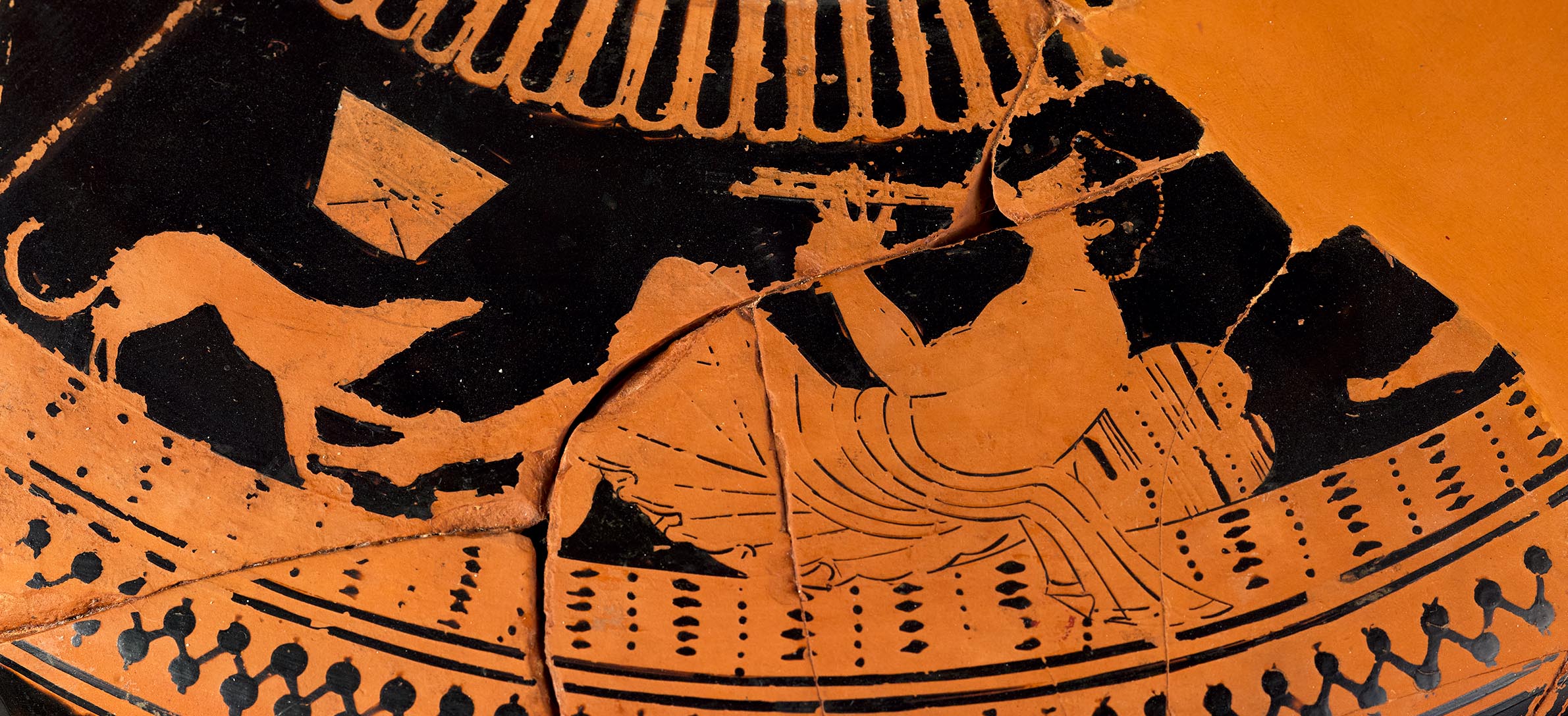 Detail showing the shoulder of the vase, depicting a symposion