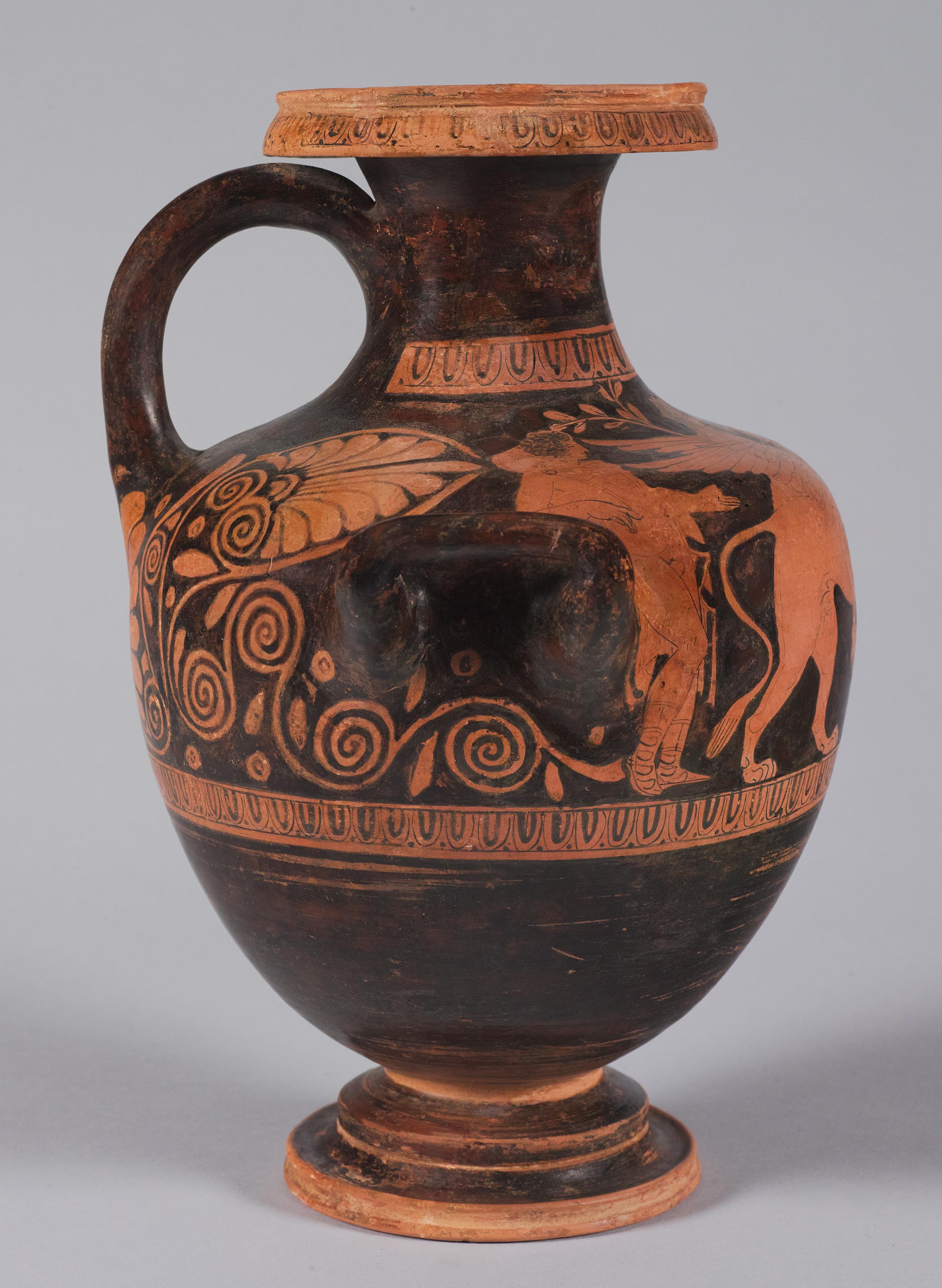 The other side of the vase, showing some decoration and a male youth on the left side