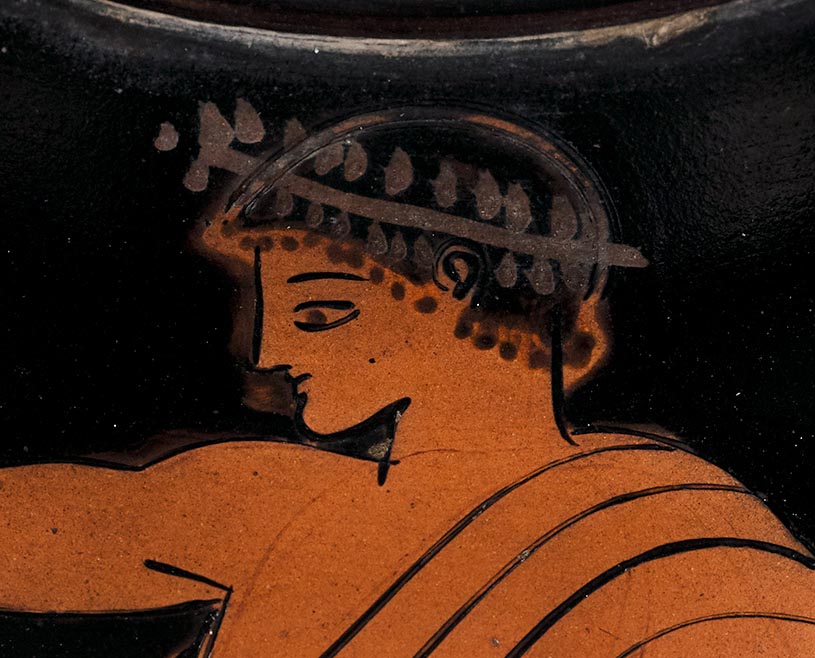 'Detail showing the youth''s face'