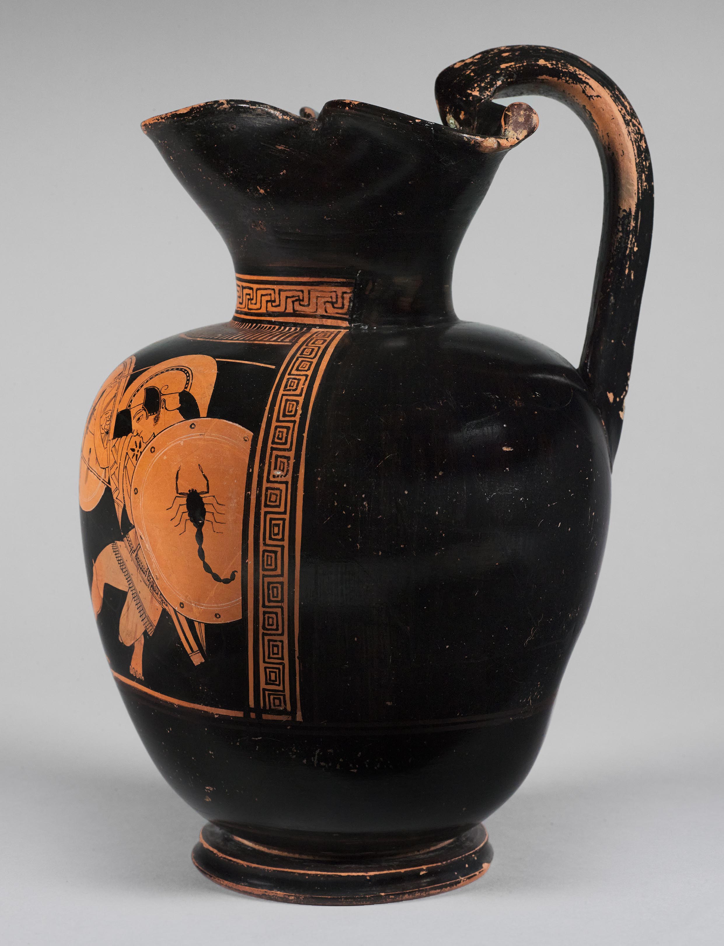 Side view of the vase, showing a partial figure on the right side 