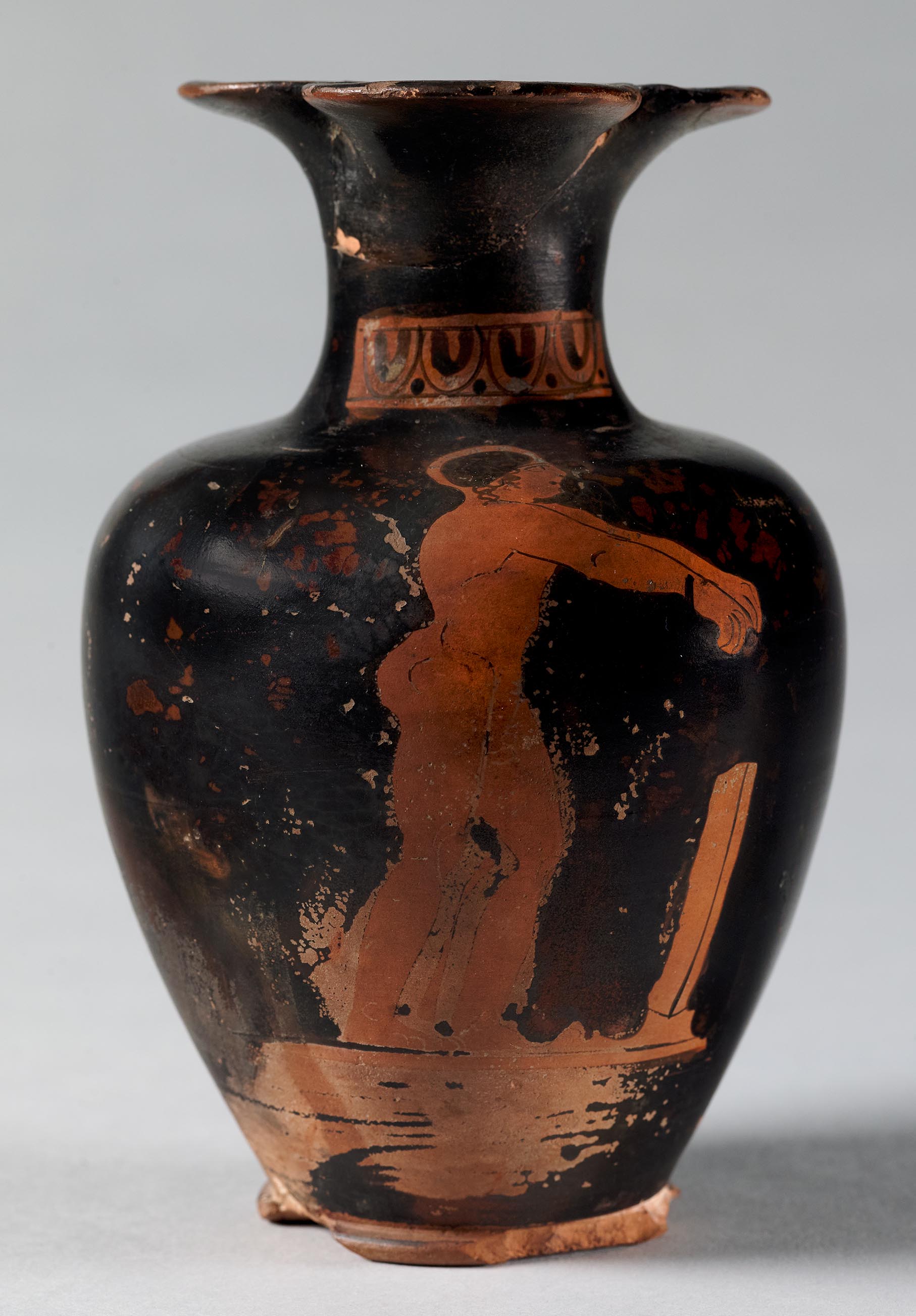 One view of a vase, the body depicting an athlete