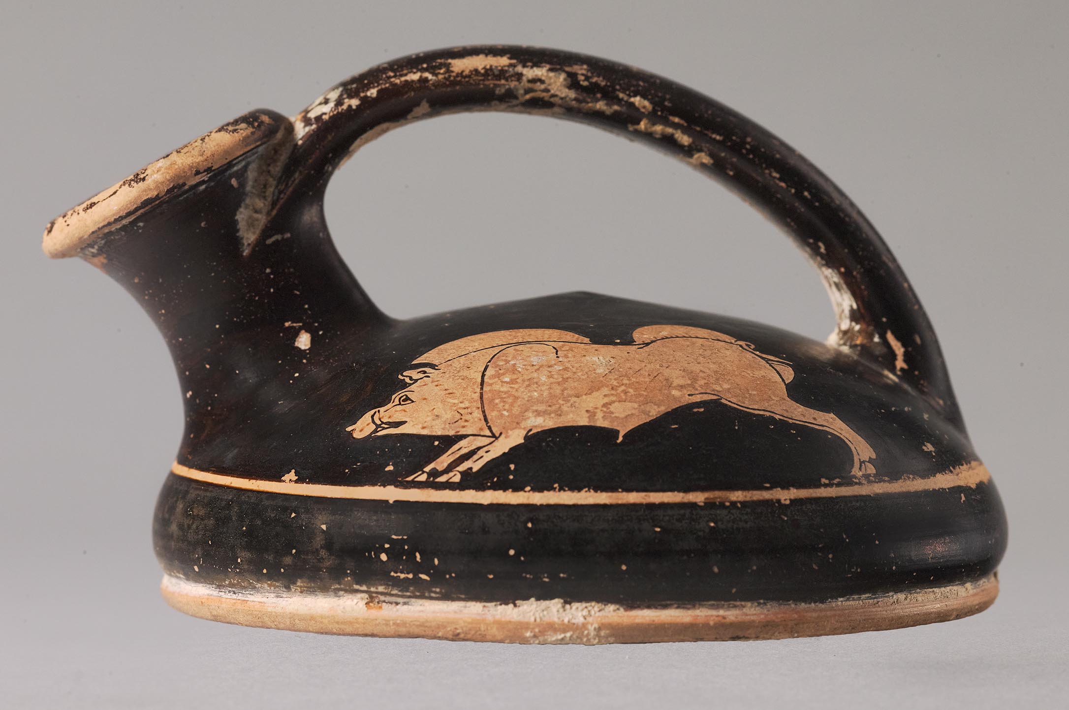 The ride side of the askos, the body depicting a boar