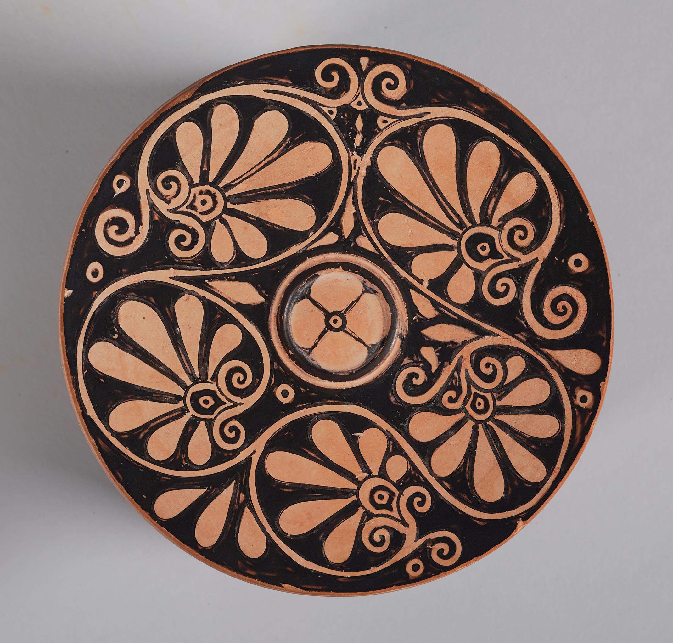 View of the top of the lid, showing painted decoration