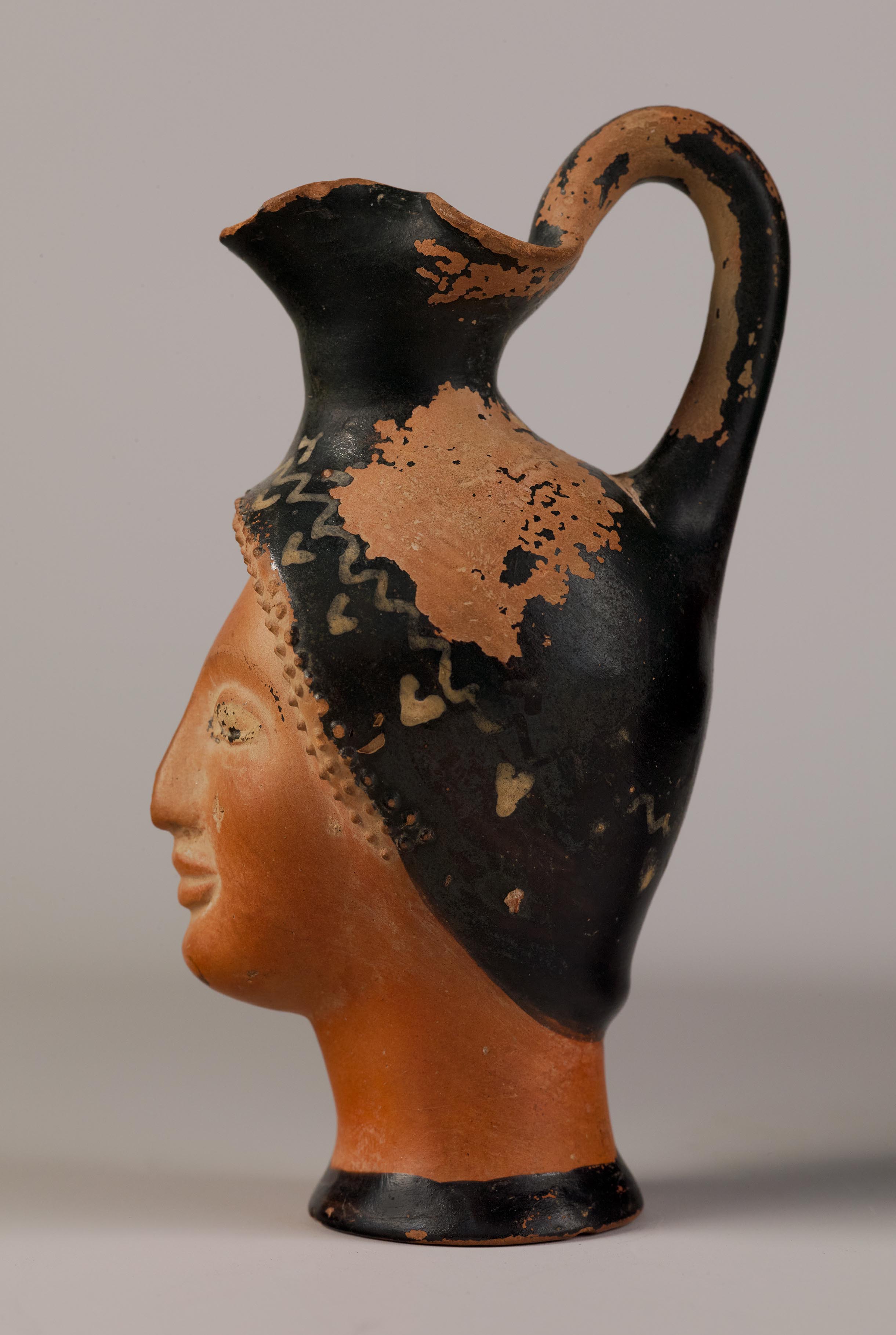 The left side of the vase