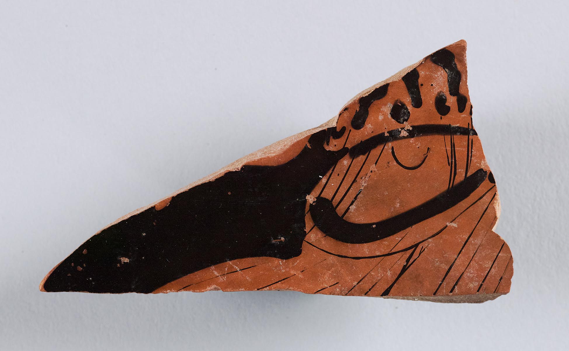 Fragment from a lekanis, the body showing the torso of a woman