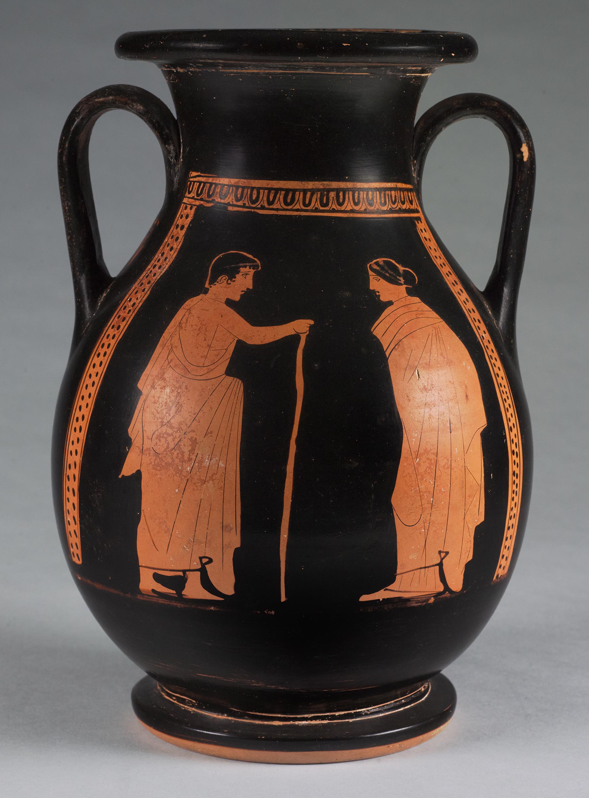 Another view of the vase, the body depicting a standing male youth and standing woman