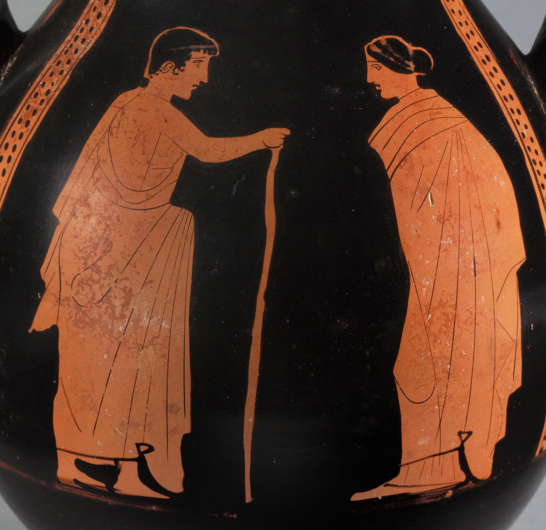 Detail showing a standing male youth and standing woman