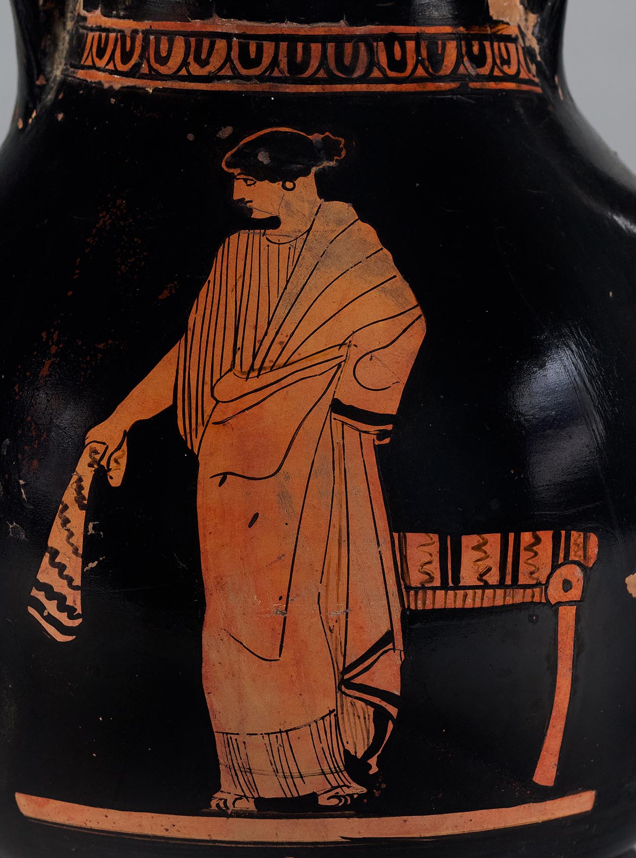 Detail showing a standing woman