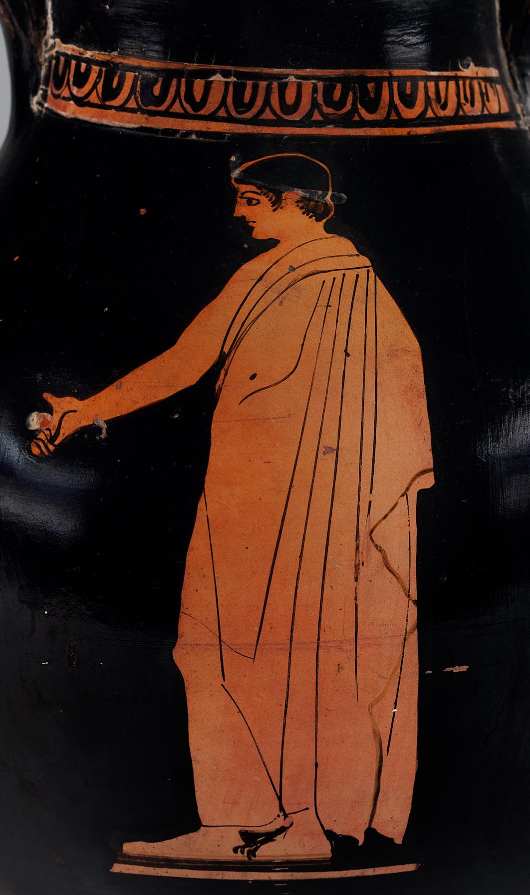 Detail showing a male youth
